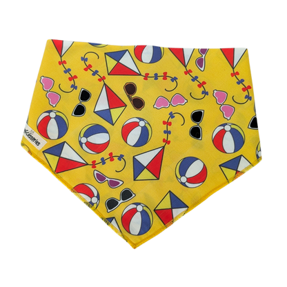 Yellow bandana with colorful beach-themed pattern on a yellow background
