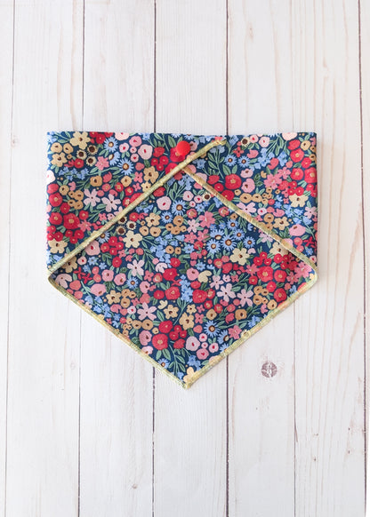 Dark blue bandana with flower pattern on white wooden background