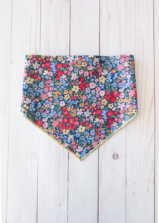 Dark blue bandana with flower pattern on white wooden background