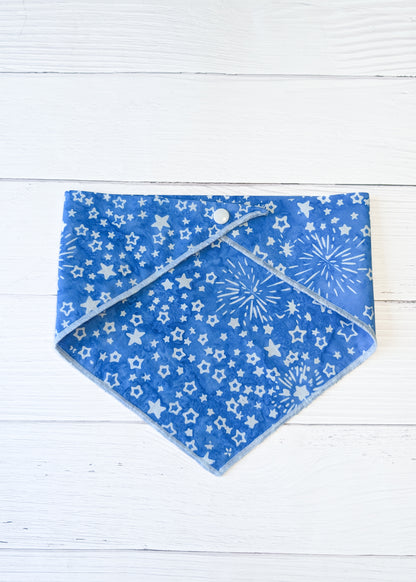 Blue bandana with star pattern on a white wooden surface