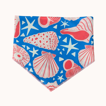 Nautical-themed bandana with shells, stars, and circles on a blue background