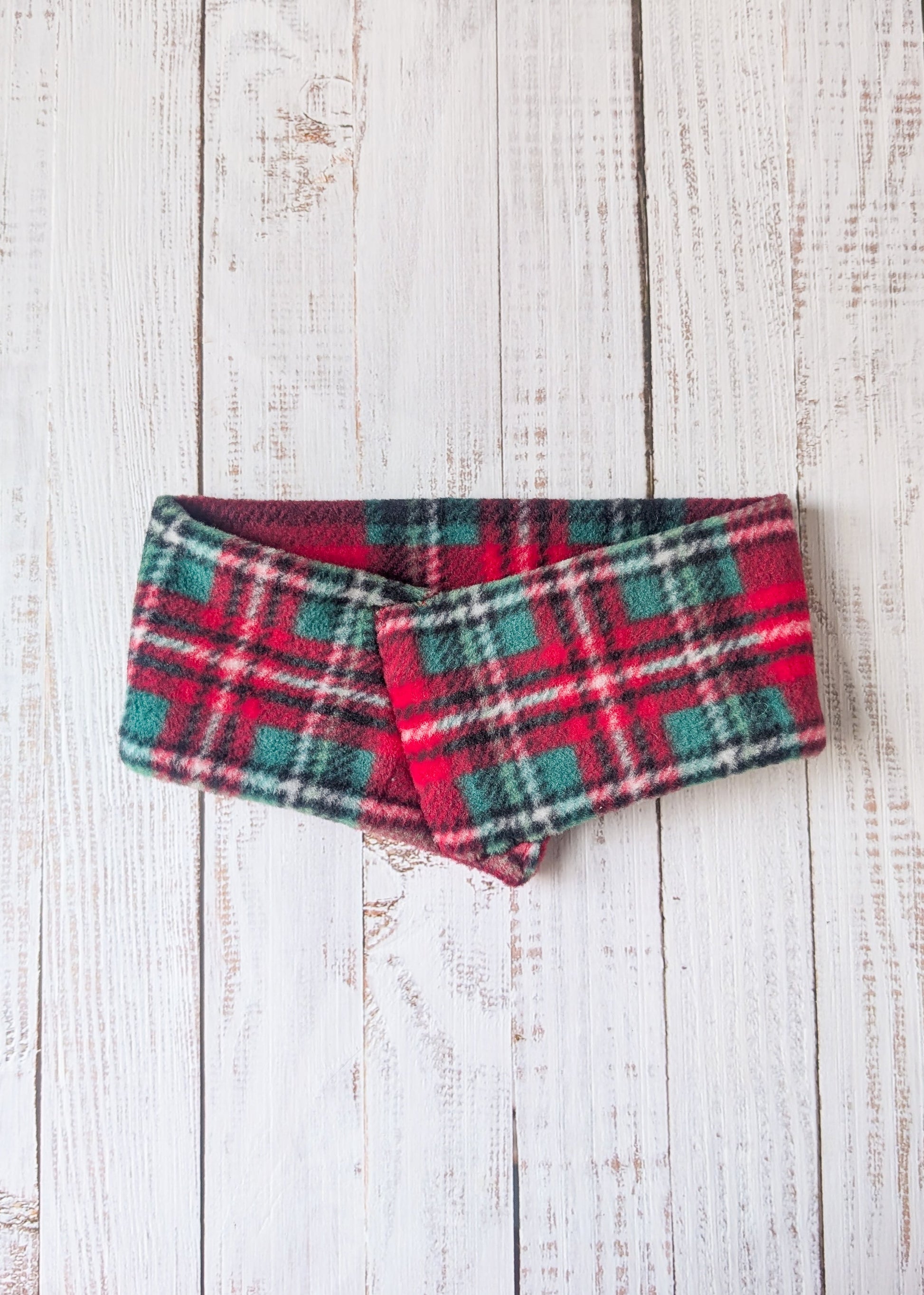 green, red, black, white plaid fleece dog scarf, front view